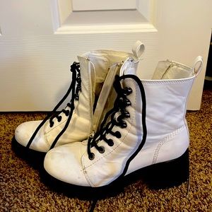 Black and white zip up boots